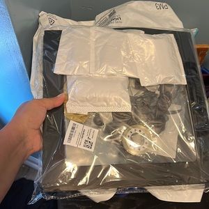 Has balloons and lights gray gold balloons